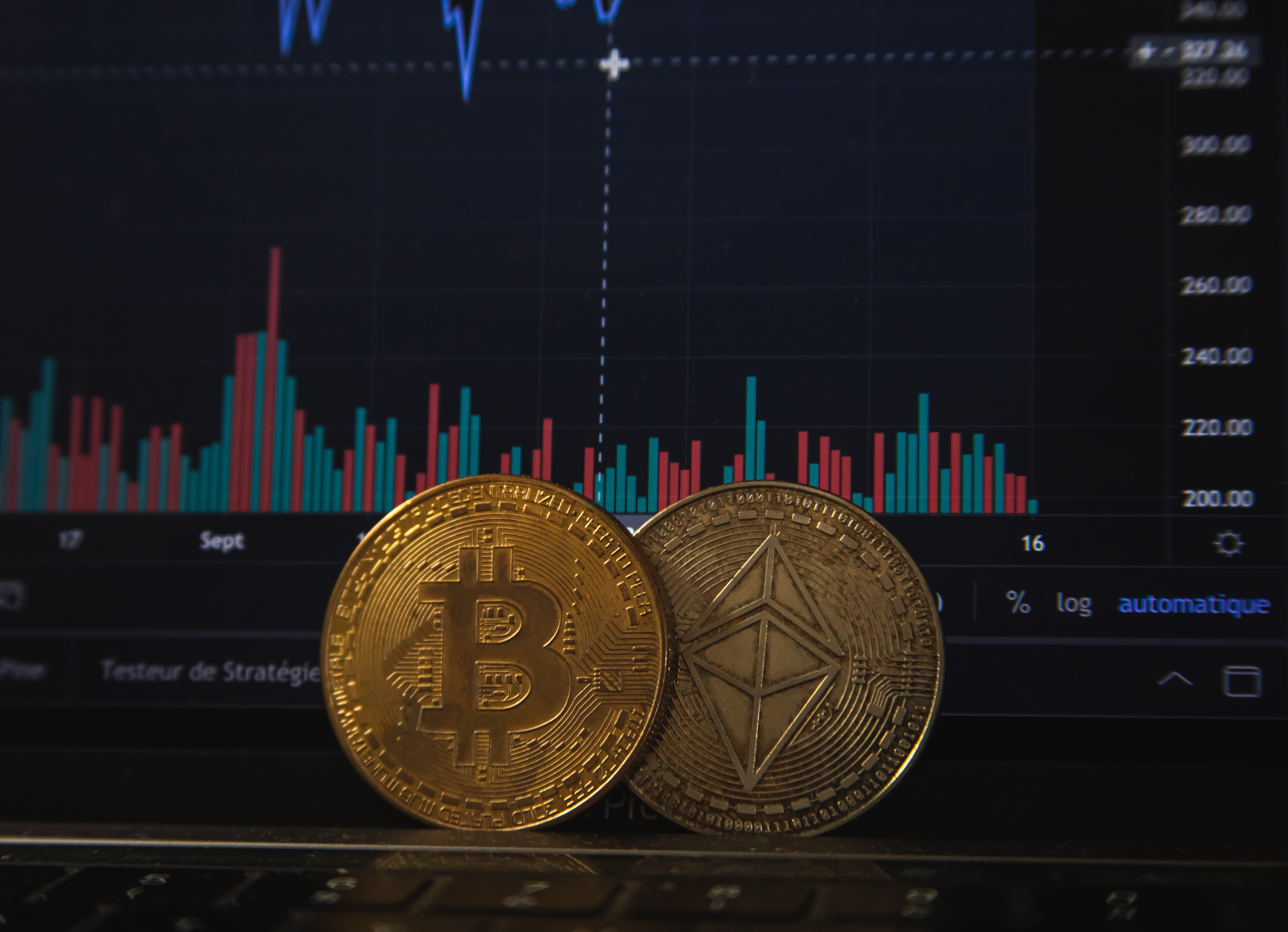 Bitcoin and Ethereum tokens Photo by Pierre Borthiry on Unsplash