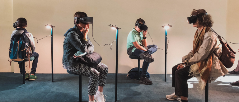 People with VR headsets on Photo by Lucrezia Carnelos on Unsplash